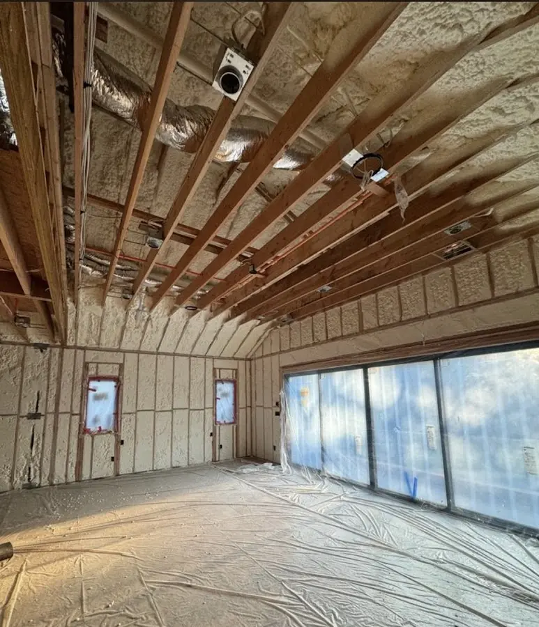 Interior walls and ceiling insulated with spray foam during new construction in South Berwick